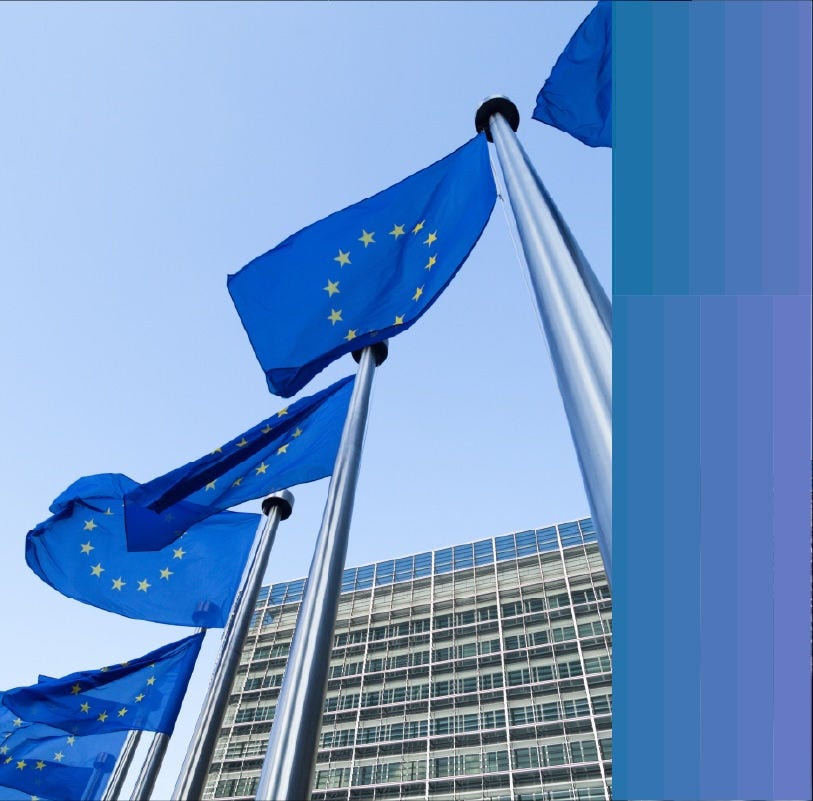 EU flags in front of the European Comission