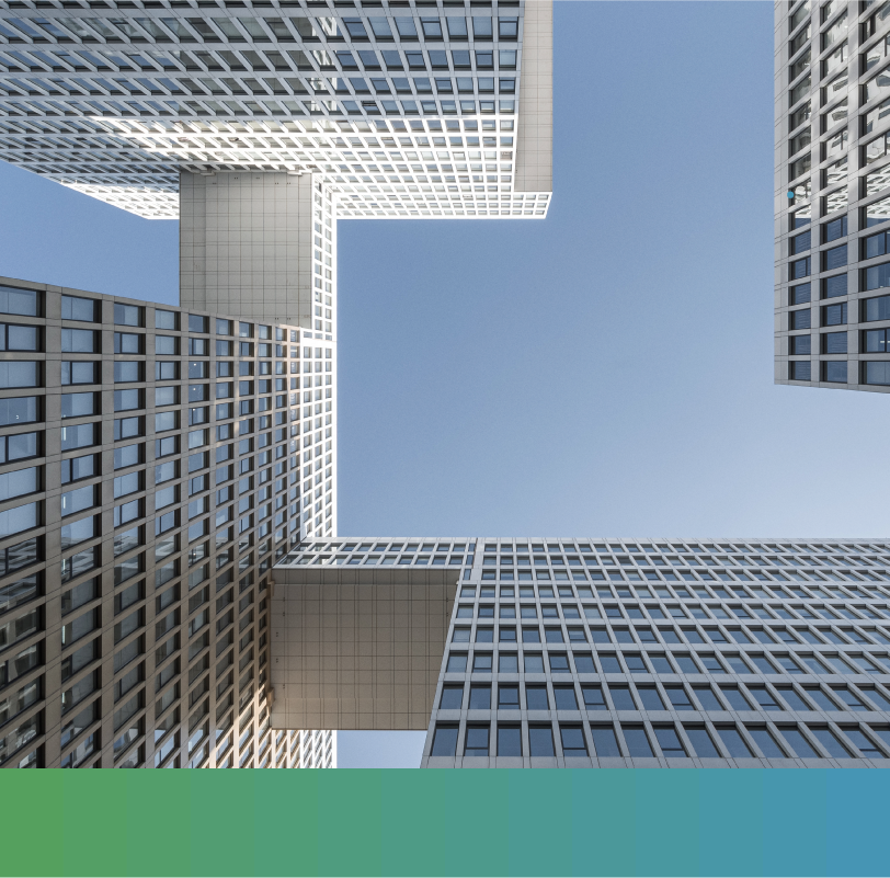 Photo looking up at tall sky scrapers